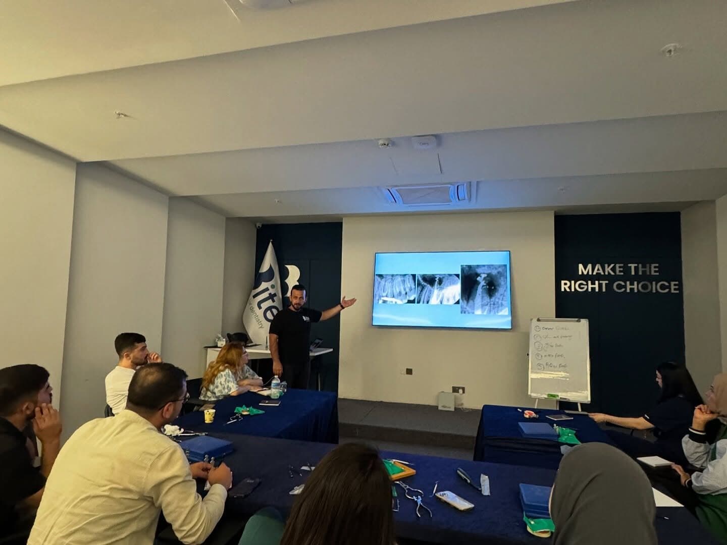 Dr. Jegr Koyi presenting X-ray cases to the course room